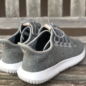 White and grey Adidas Tubulars